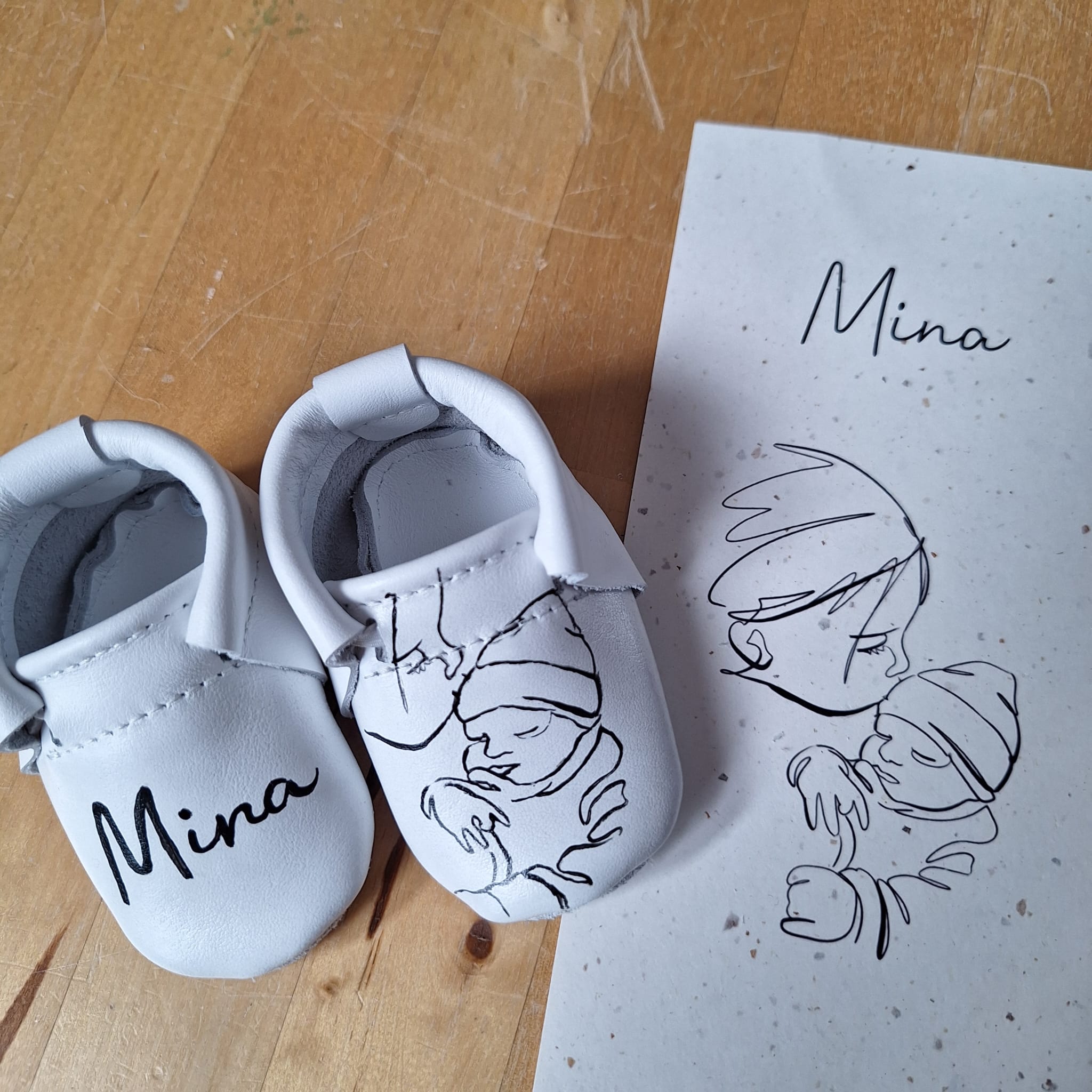 Gepersonaliseerde babyslofjes als kraamcadeau